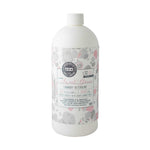 A bottle of Sweet Grace Laundry Detergent with a floral pattern on the label.