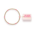 Beaded bracelet with pink beads on a white background, featuring the brand 'Beaded Blondes'.