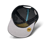 Interior view of a black baseball cap with a grey brim and patterned lining
