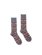 Pair of gray socks patterned with red streetcars