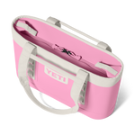 Pink YETI tote bag with white handles on a white background