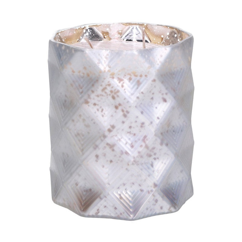 A silver glass candle holder with a geometric diamond pattern.