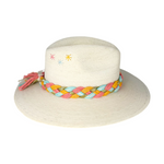 A white wide-brimmed hat with a colorful braided band and small decorative flowers on the crown.