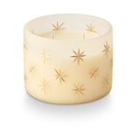 Winter White candle in frosted glass with gold star designs
