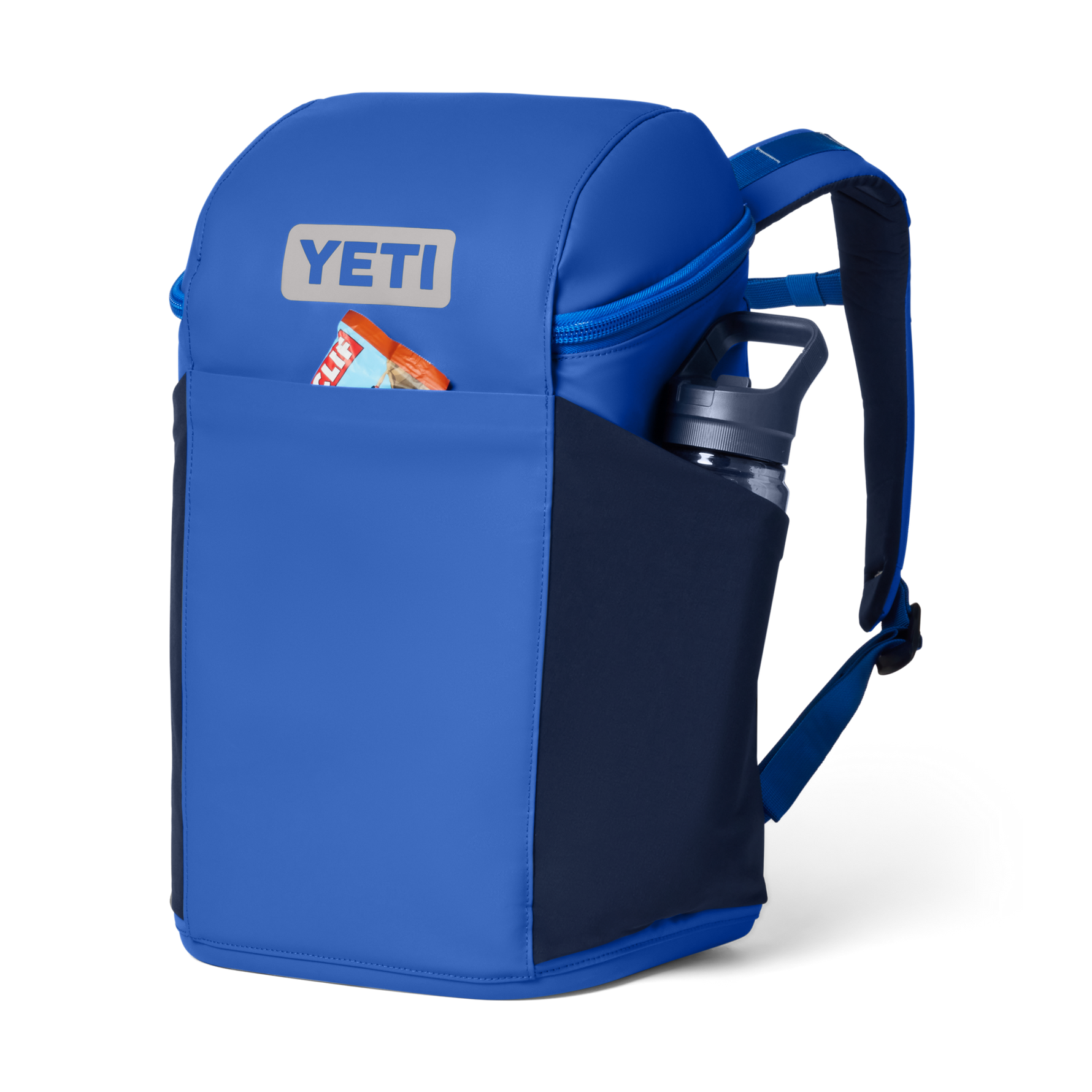 Blue YETI backpack with a water bottle and snack on a white background
