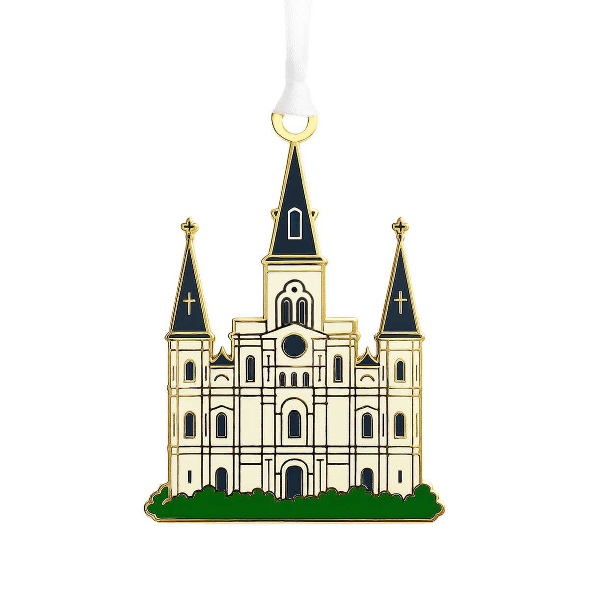 Gold and enamel ornament of a white cathedral with three dark spires on a white ribbon