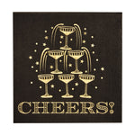 Black napkin with gold foil champagne tower graphic and the word Cheers
