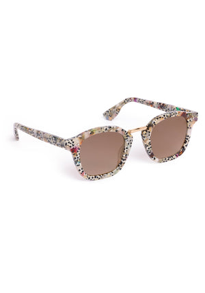 Sunglasses with floral patterned frame on a white background
