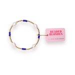 Bracelet with blue beads and gold accents on a white background, featuring 'Beaded Blondes' packaging.