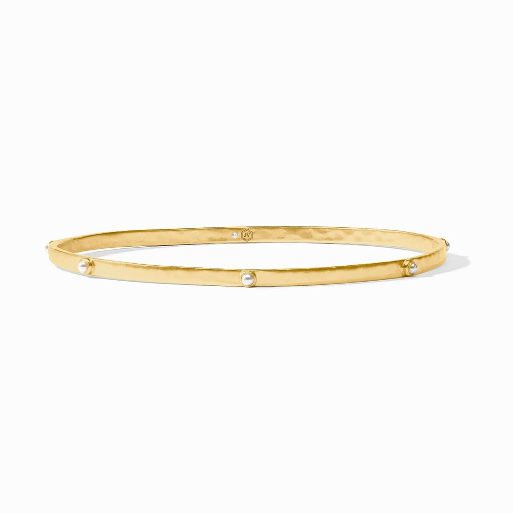 Gold bangle bracelet with small white pearls set at intervals