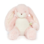 A plush pink bunny with outstretched legs, velour lined ears, and embroidered features.