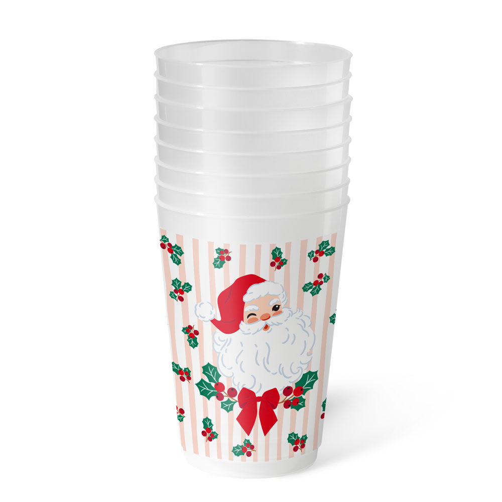 Stack of frosted party cups with a winking Santa, holly and pink stripes
