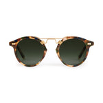 Sunglasses with tortoiseshell frame and dark lenses on a white background