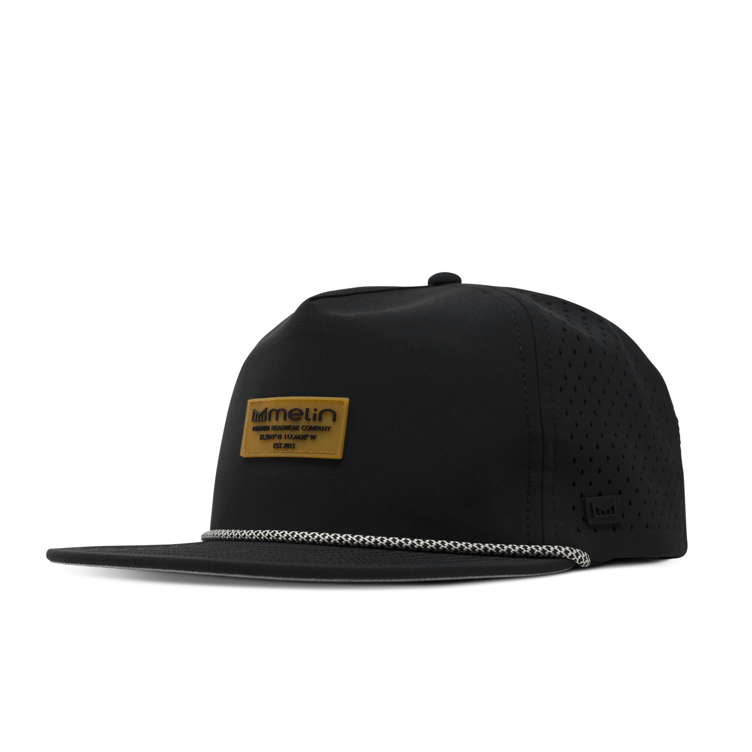 Black five panel snapback hat with perforated side panels and a tan branded patch on the front