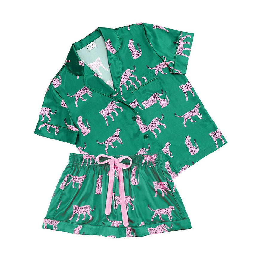 Green pajama set with pink animal pattern on a white background