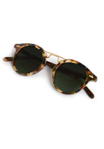 Tortoiseshell sunglasses with gold frames on a white background