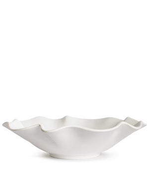 White melamine bowl with wavy edge on a white background