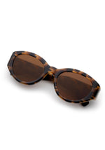 Oval tortoiseshell sunglasses, angled view