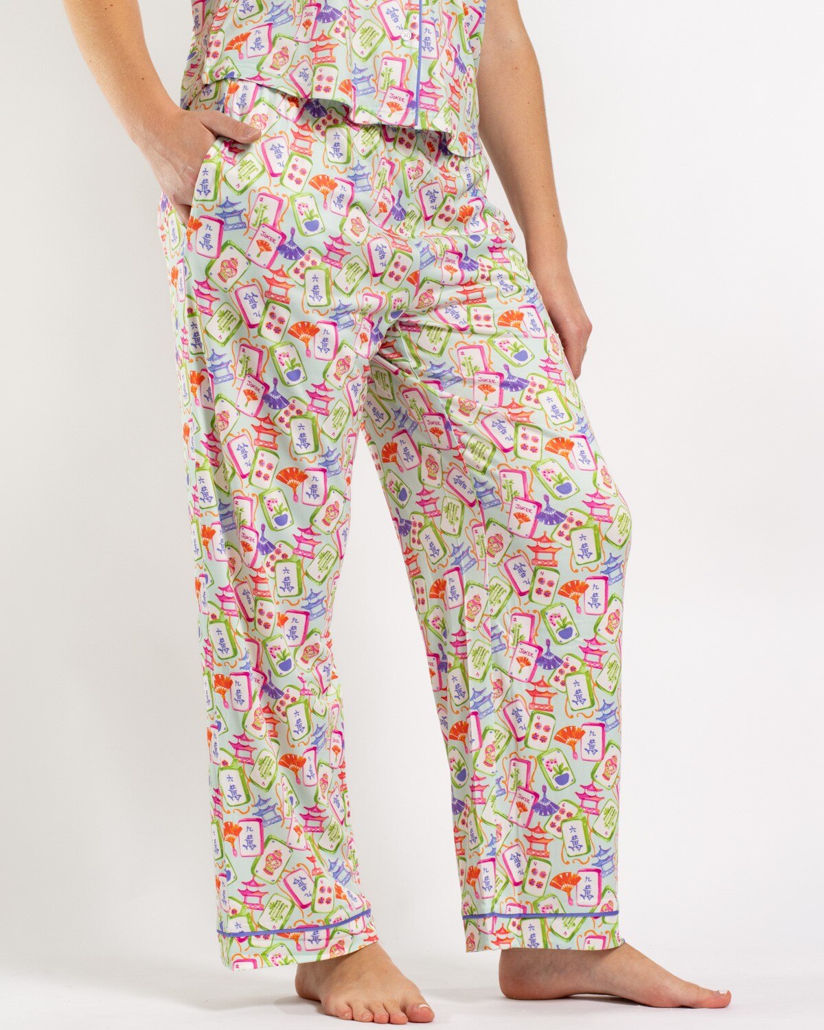 Light blue pajama pants with a colorful mahjong tile print