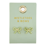 Green crystal bow stud earrings on a Mistletoes and Bows card