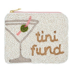 White beaded zip pouch with a martini glass and olive and "tini fund" in gold beads