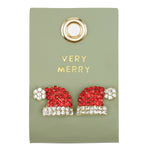 Red and clear crystal Santa hat stud earrings on a sage green card reading "Very Merry"