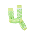 Light green crew socks with margarita glass and lime slice pattern and the word Fiesta on the foot