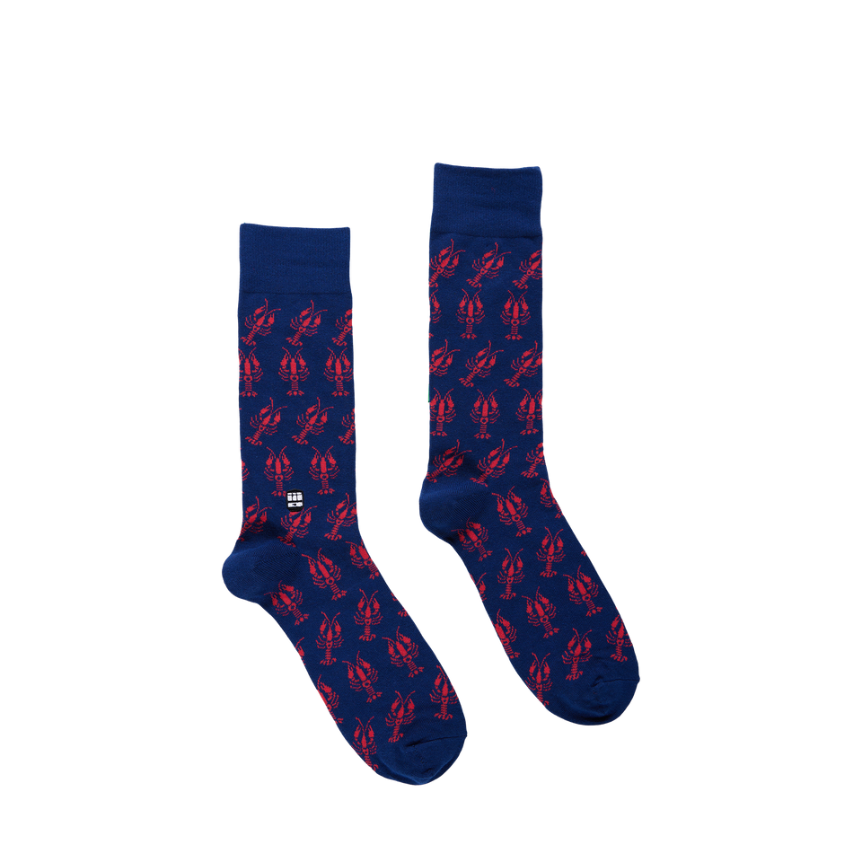 Navy blue crew socks with a repeating red lobster pattern