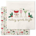 Cream cocktail napkin reading "making spirits bright" with cocktails and holly, over a print napkin