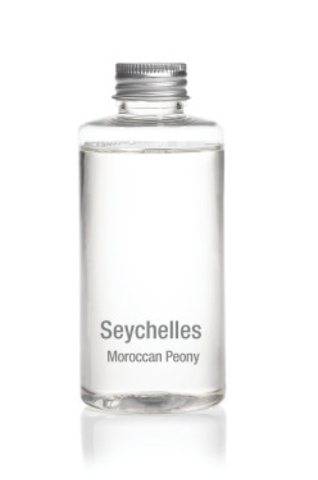 Clear bottle of fragrance oil with a silver cap labeled Seychelles Moroccan Peony
