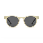 Beige sunglasses with dark lenses on a white background