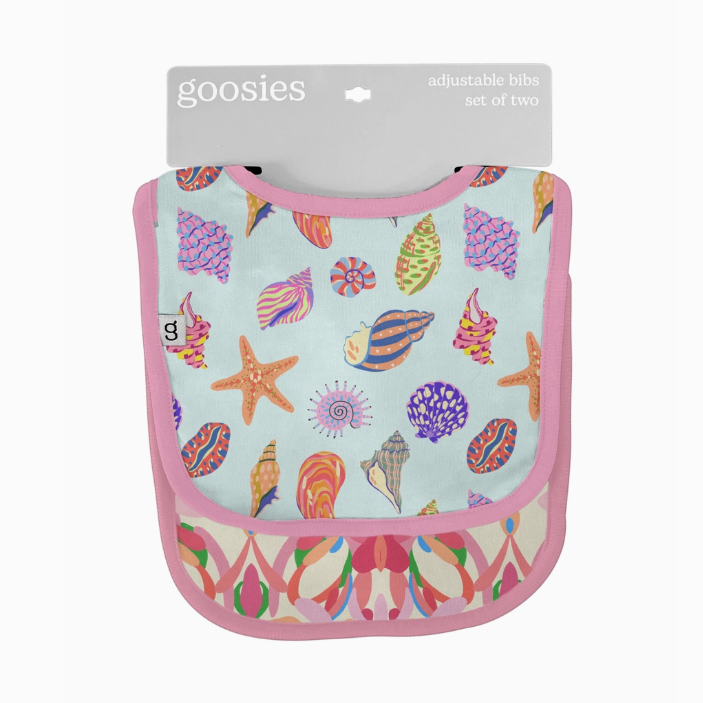 Goosies adjustable bibs set of two with an oceanic theme on a light blue background featuring vibrant colorful seashells and starfish patterns with bright pink trim