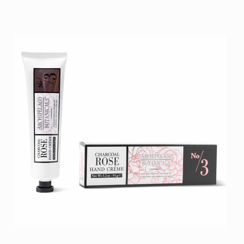 Charcoal Rose Hand Crème packaging with tube and box on a white background