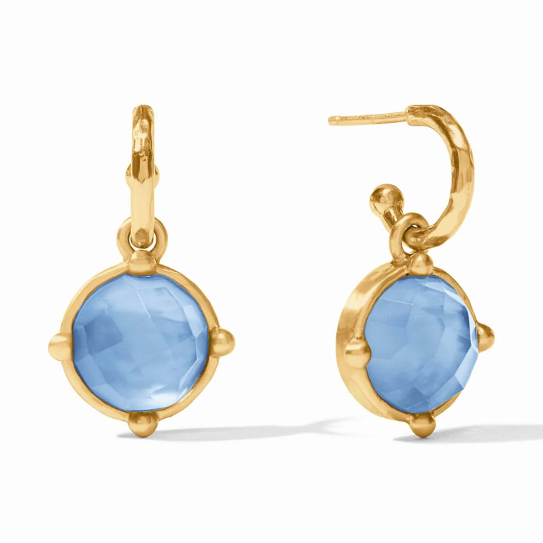 Gold hoop earrings with round blue faceted stone charms