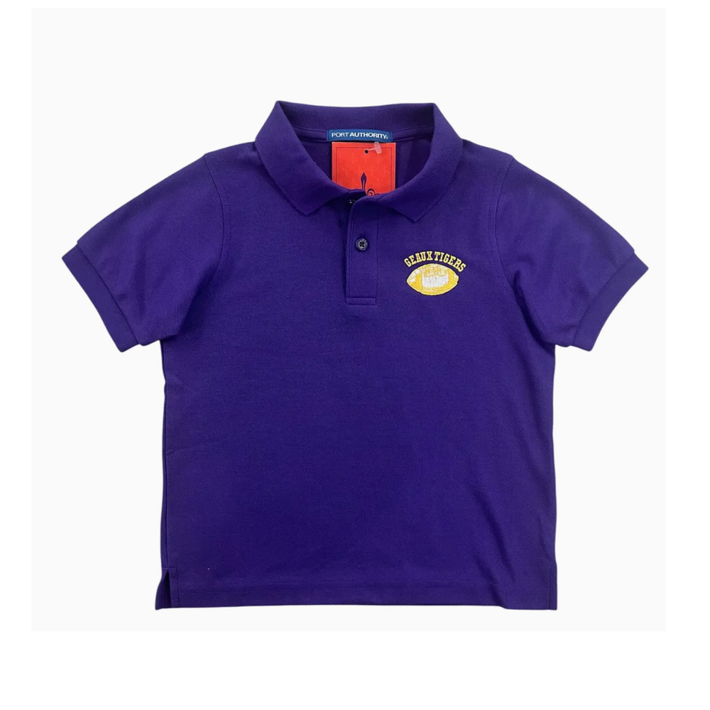 Product photograph of a Port Authority purple polo shirt displayed on a white background featuring an embroidered yellow football with GEAUX TIGERS text and a vibrant red interior tag