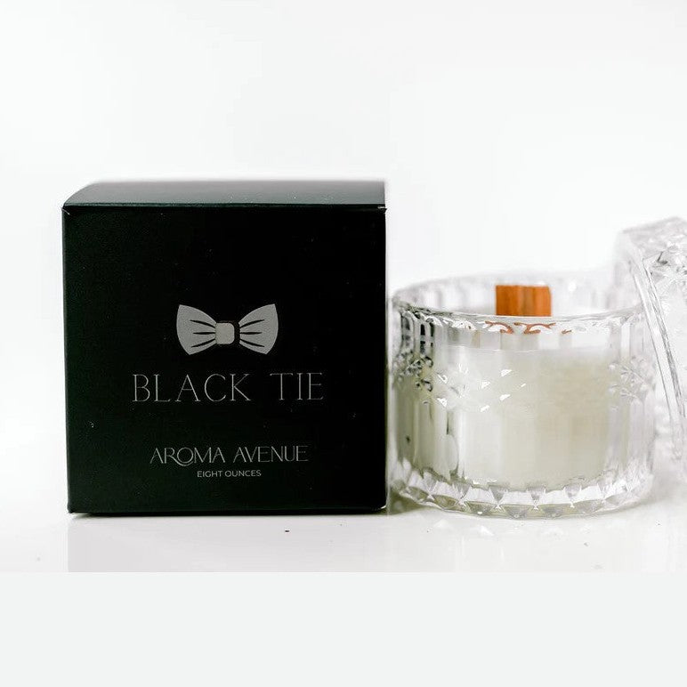Aroma Avenue Black Tie candle with packaging on a white background