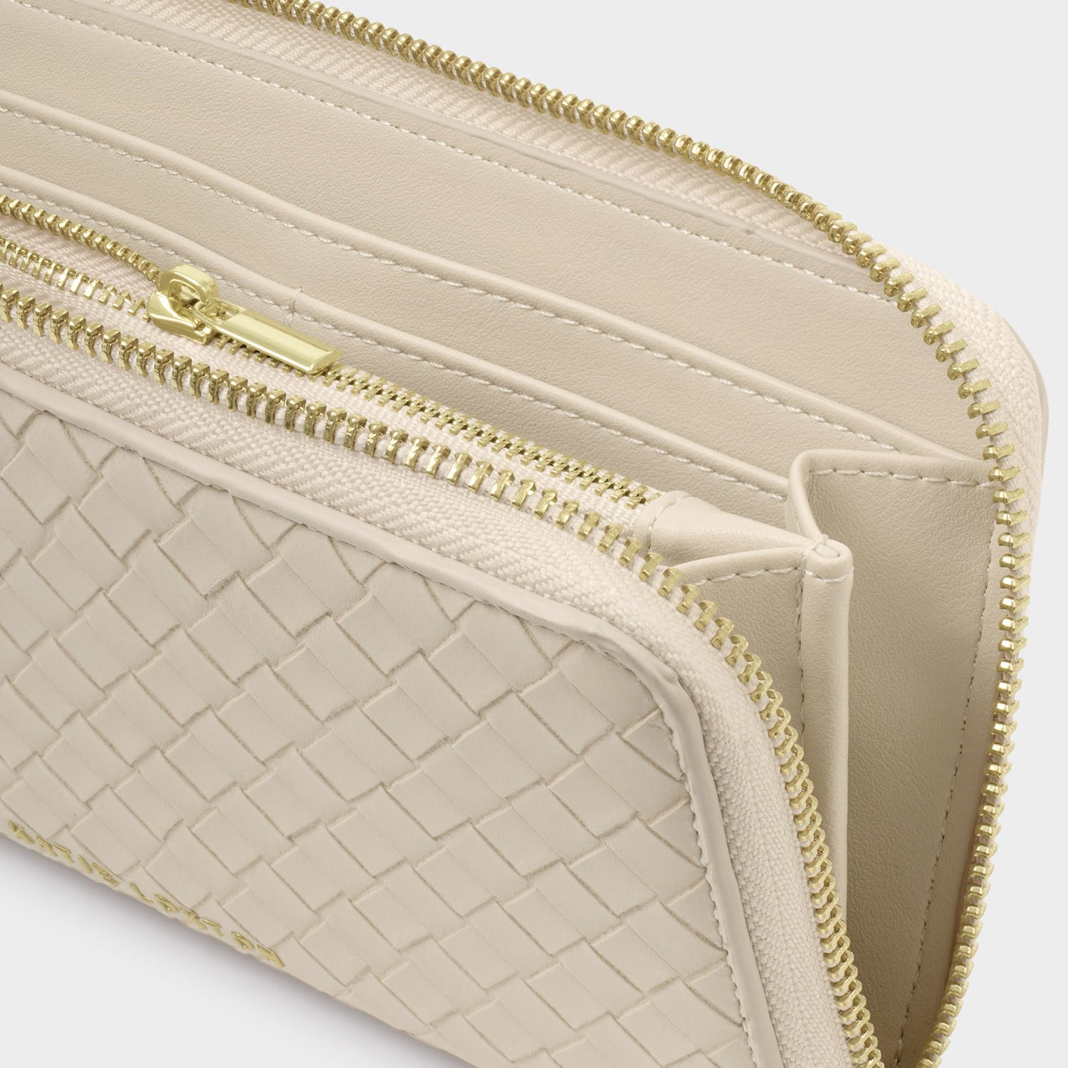 Woven synthetic leather wallet by Aldo featuring a cream-colored zip-around design with gold-toned hardware, multiple interior card slots, and a textured weave pattern