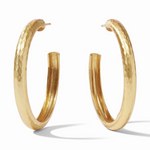 Pair of gold hoop earrings with a hammered texture