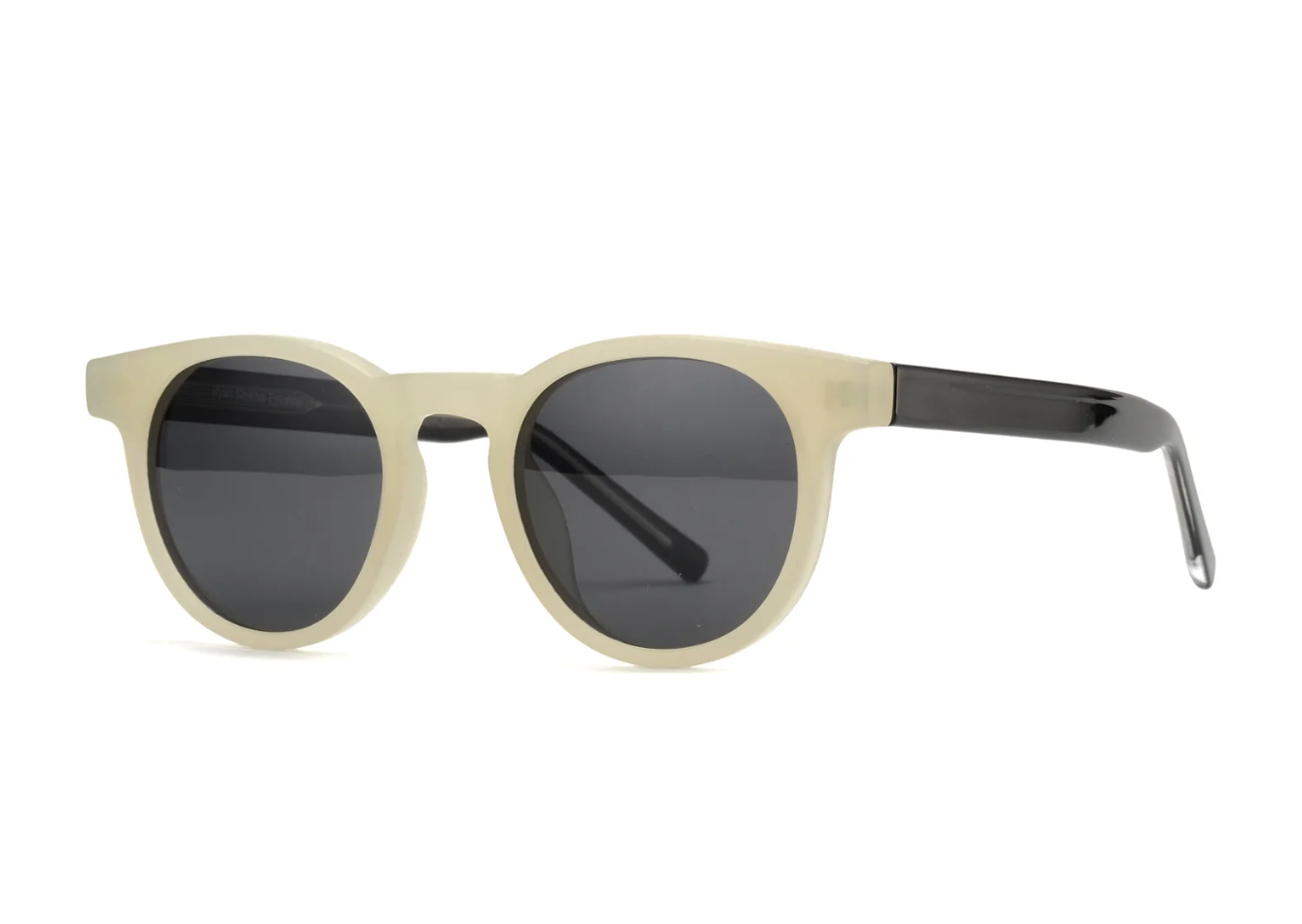 Beige sunglasses with black lenses on a white background