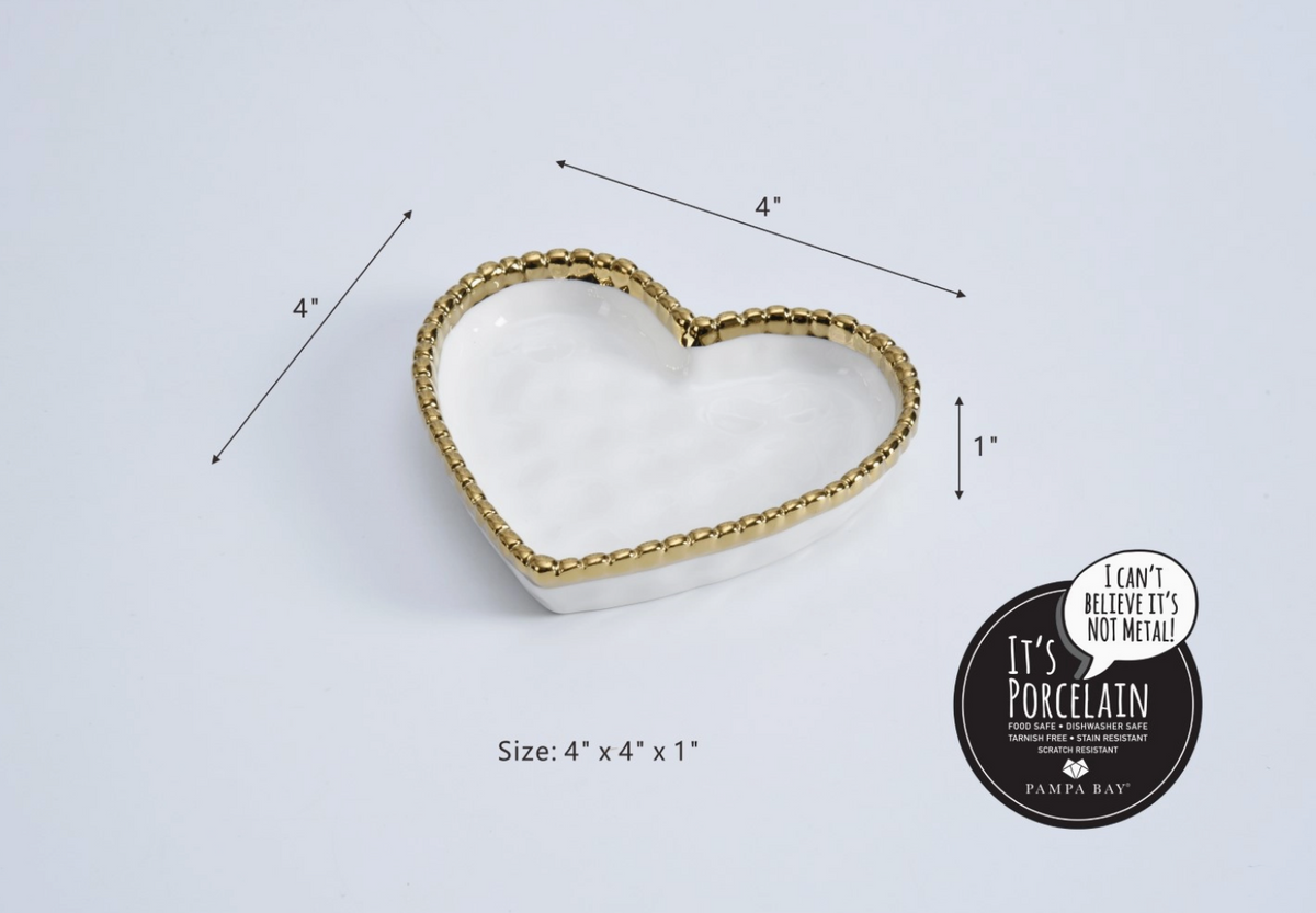 Gold-trimmed white heart dish with measurements