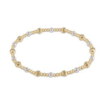 Gold beaded bracelet with alternating pearl accents and ribbed gold beads