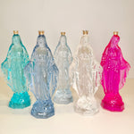 Five colorful statues of a religious figure with a white background