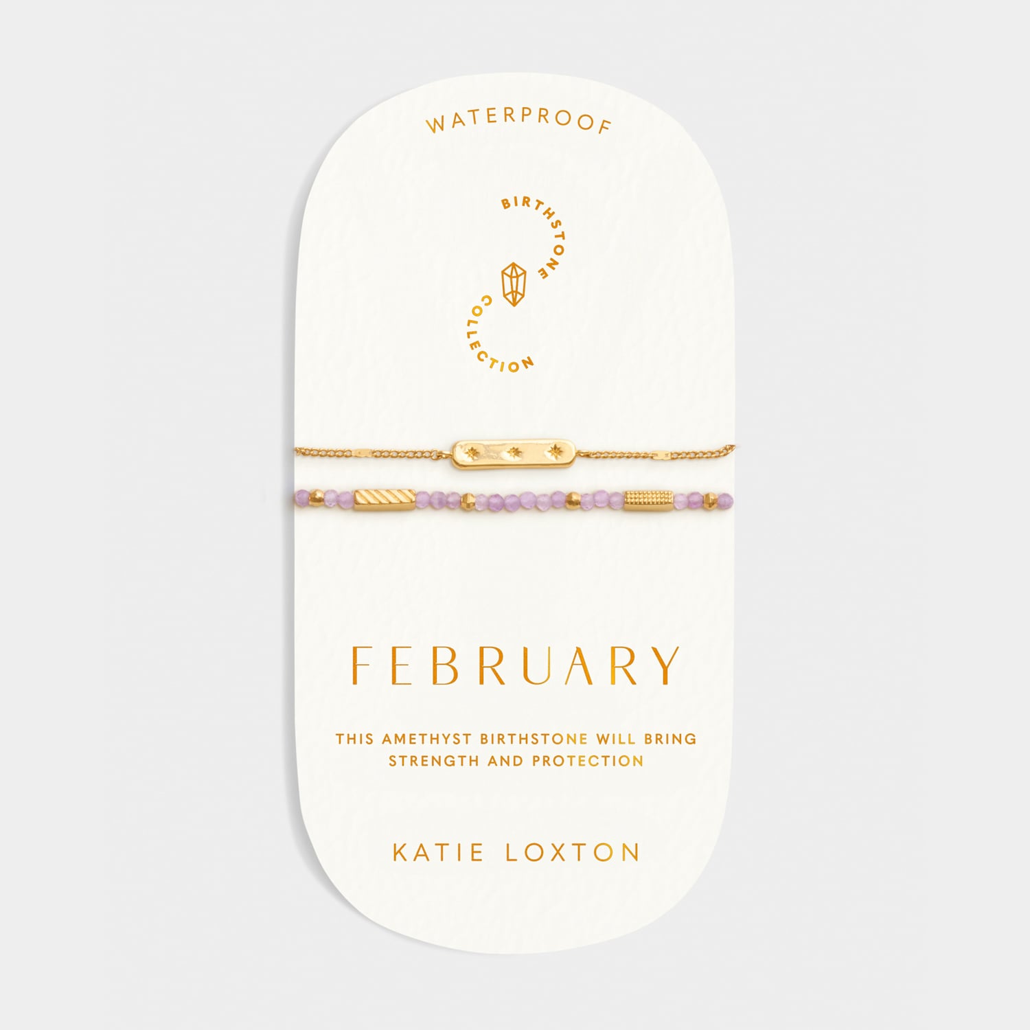 Two gold tone bracelets with purple amethyst beads on a February birthstone collection display card