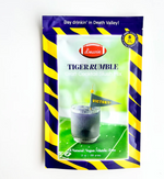 Graphic design by d'marie features a Tiger Rumble Craft Cocktail Slush Mix pouch depicting a purple frozen drink on a football field in Death Valley with a yellow Victory pennant and bold purple and yellow tiger-striped borders