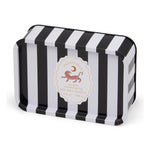 Paddywax Black Cedar & Fig Soy Wax Candle in a rectangular tin with bold black and white vertical stripes and a cream-colored label featuring an orange tiger and gold crescent moon