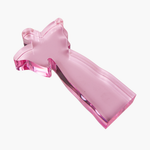 Pink acrylic sculpture of a stylized star with an elongated, tapering body on a white background, showcasing translucent material, thick polished edges, and vibrant light refractions