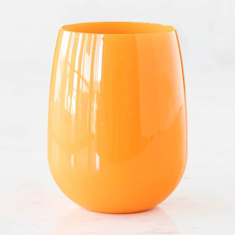 Glass art, a vibrant orange stemless vase with a high-gloss finish, tapering slightly upwards from a rounded base against a clean white studio background