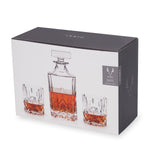 VISKI product packaging showing a lead-free crystal decanter and two tumblers with faceted designs filled with amber whiskey on a white background, featuring dark grey top and side panels