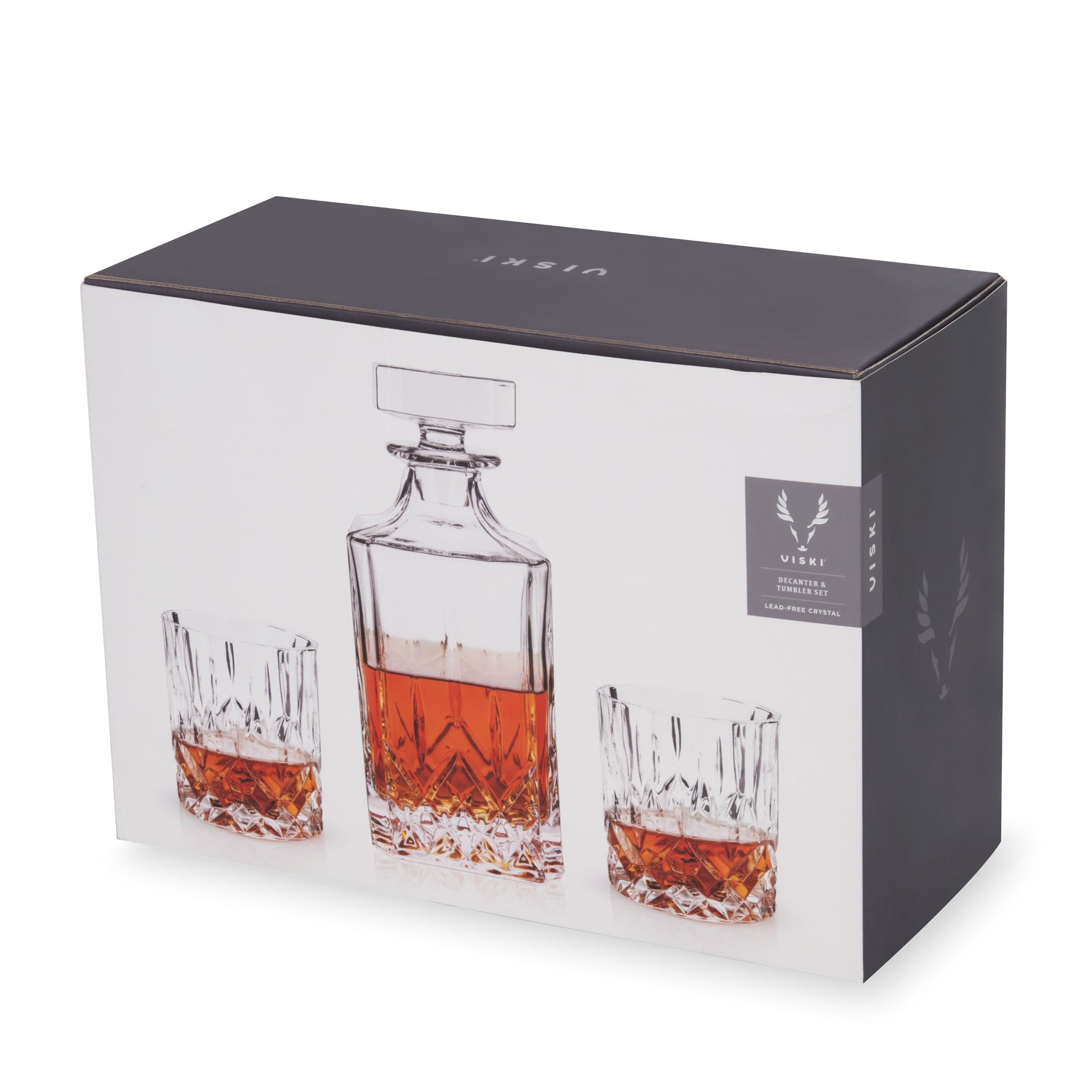 VISKI product packaging showing a lead-free crystal decanter and two tumblers with faceted designs filled with amber whiskey on a white background, featuring dark grey top and side panels