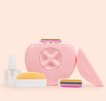 Pink razor travel case with spray bottle and replacement blades